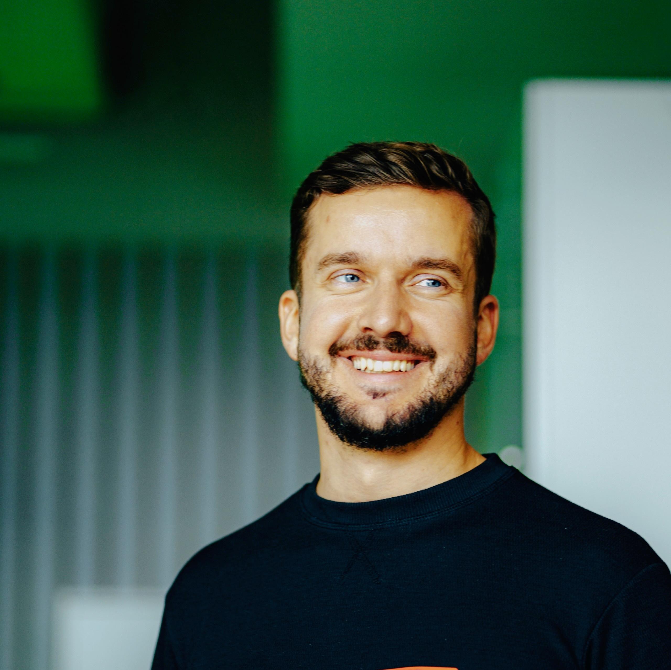 Photo of Aleksander Uznański, Founder